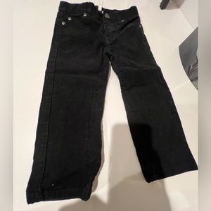 Black Janie and Jack pants with zipper and button. Lightly worn.